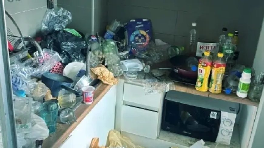 Condo owner fumes as foreign tenant exits, leaving a garbage-filled apartment.
