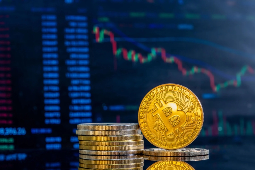 Bitcoin dips amid predictions of a crypto market top.