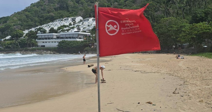 Red flags warning for swimmers after  missing American man at Nai Harn Beach.